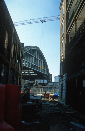 11744. The new E side arches seen through existing buildings St Pancras. 18.02.2003