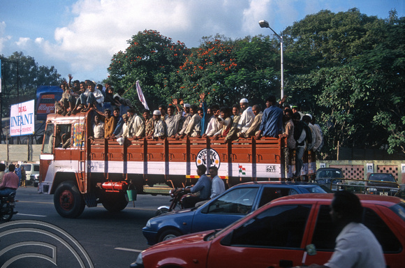 T6202. Heading for Friday prayers. Bangalore. Karnataka. India. December.1997