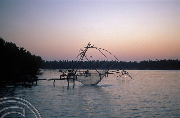 T6355. Chinese fishing nets on the backwaters at sunset. Kerala. India. 29.12.1997
