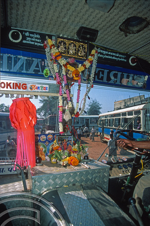 T6111. Shrine in on a bus dashboard.. Mapusa. Goa. India. 10.12.1997