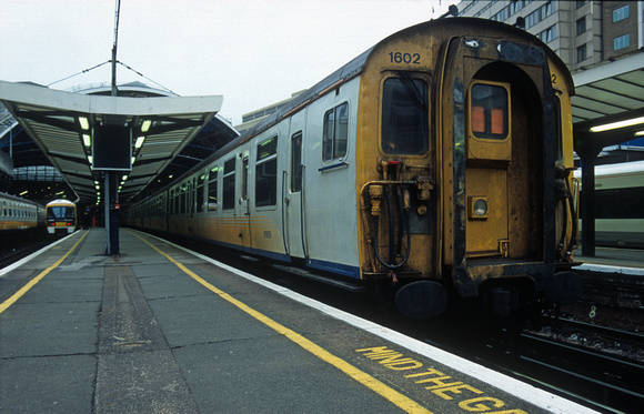 11854. 1602. Waiting to head into Kent. London Victoria. 3.03.2003.