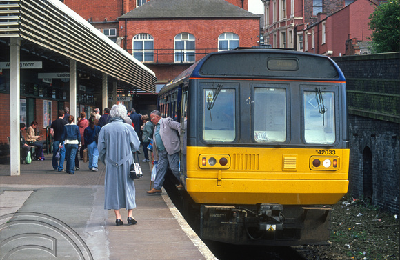 12156. 142033 terminating before working a service to Shaw. Wigan Wallgate. 22.4.03