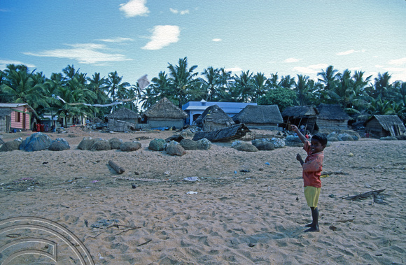 T6366. Young boy flying his kite. Anjengo. Kerala. India. December.1997