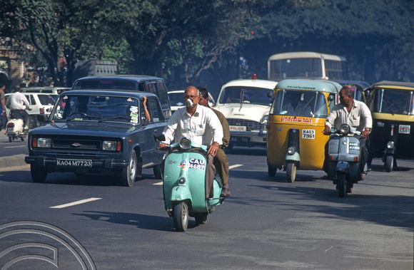 T6194. Traffic on MGR Rd. Bangalore. Karnataka. India. December.1997
