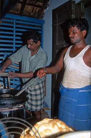 T6358. Cooking pooris at the Udhaya. Varkala. Kerala. India. December.1997