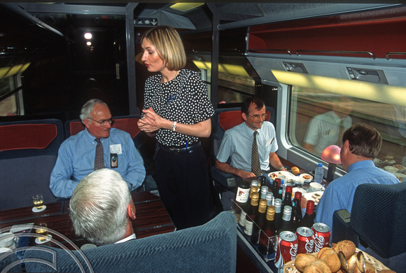 12628. Stewardess serving food in 1st Class. HS1. 30.7.03