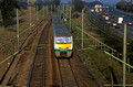 11969. 321333 heads South past traffic on the A12. Boreham. 18.3.03