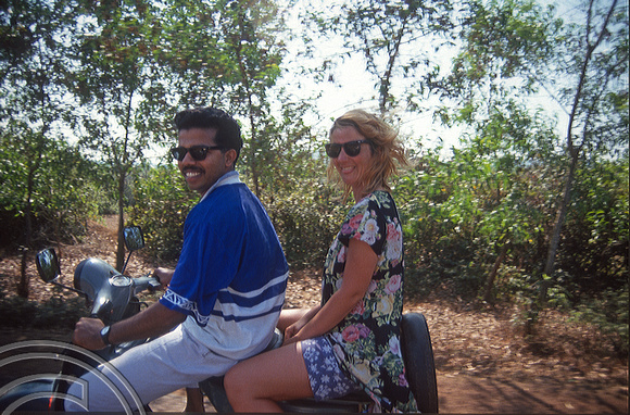 T4523. Anand and Lynn on a scooter. Goa. India. December 1993.
