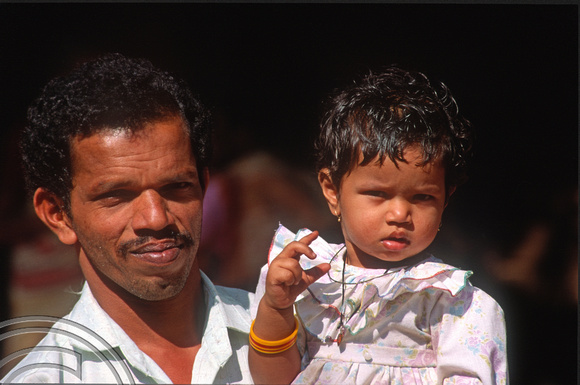 T4516. Umesh Gawade and daughter Anuja. Arambol. Goa. India. December 1993.