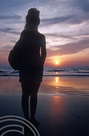 T4558. Lynn walking on the beach. Arambol. Goa. India. December 1993.