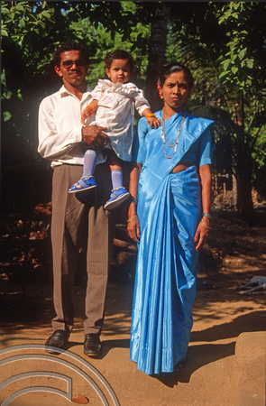 T4545. Umesh his wife and Anuja.  Maharasthra. India. December 1993.