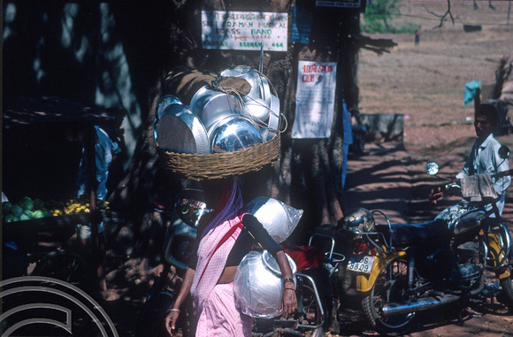 T4549. Selling pots and pans. Arambol. Goa. India. December 1993.