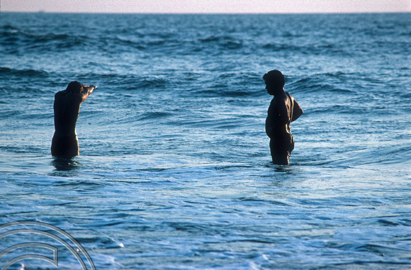 T4574. Lynn teaching Anand to swim. Arambol. Goa. India. January 1994.