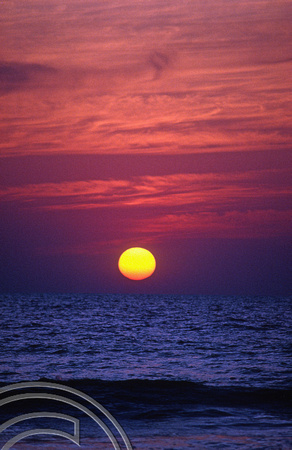 T4562. New Years Eve sunset on the beach. Arambol. Goa. India. 31st December 1993.