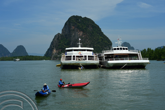 DG263583. Tourist canoe trips around Phang Nga Bay. Thailand. 29.1.17