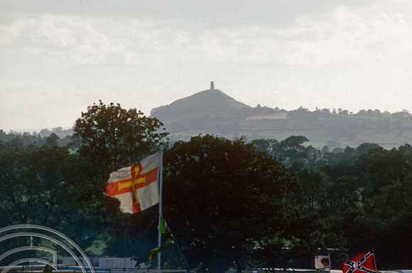 T02767. Tor in the background. Glastonbury festival. June 1990