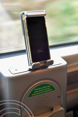 DG399461. 390114. Induction phone charger on a Pendolino. 31.7.2023.