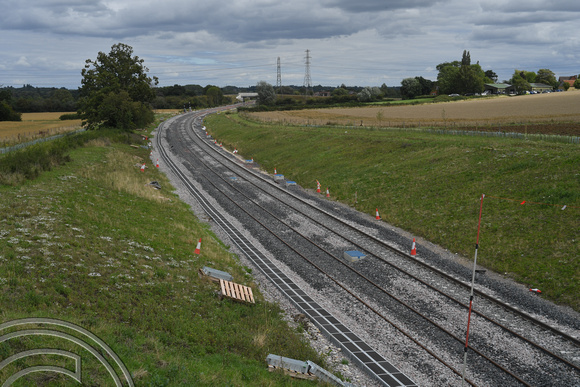 DG399906. E-W rail tracklaying seen from Sandill Rd. Steeple Claydon. 1.8.20