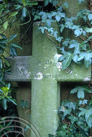 T5457. Overgrown gravestone. Highgate cemetery. London. England. 1996