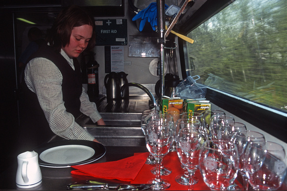 12188. GNER staff from Leeds wash glasses in the buffet on a KX-Edinburgh trip. 16.04.03