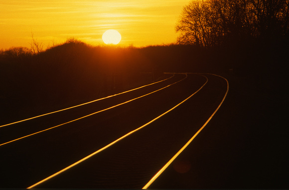 21035. Sunset along the tracks at Washstones level crossing. 13.2.01