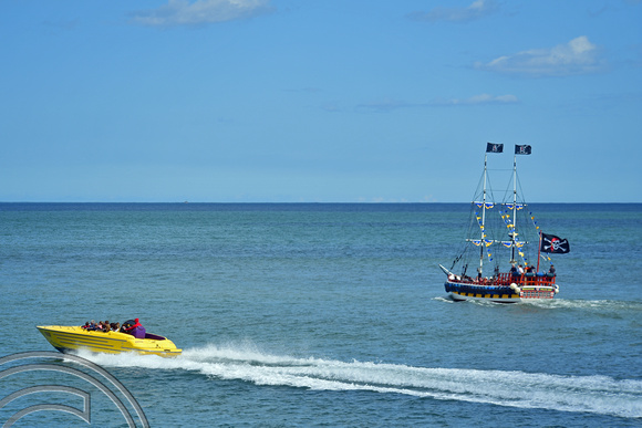 DG400255. Speedboat and the pirate ship. Bridlington. East Yorkshire. 8.8.2023.