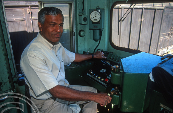 17120. Driver in the cab of 768 after arriving from Kandy. Matale. Sri Lanka. 06.01.04