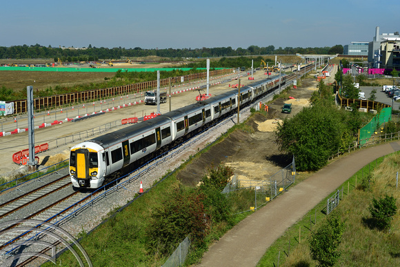 DG401898. 387108. Passes the new Cambridge South station site. 7.9.2023.