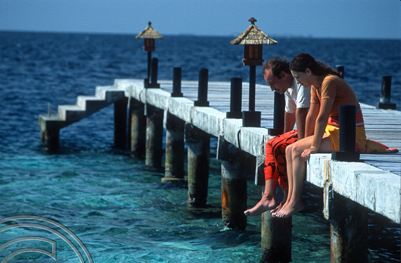 17261. Watching the fish. Eriyadoo Island. Maldives. 15.1