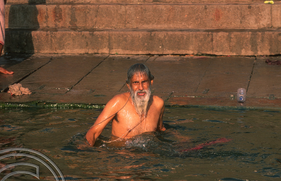 T6871. Bathing at the ghats. Varanasi. Uttar Pradesh. India. February 1998. jpg