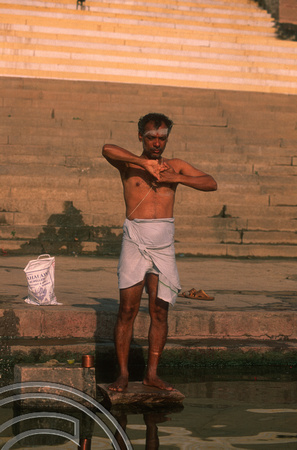 T6874. Praying at the ghats. Varanasi. Uttar Pradesh. India. February 1998