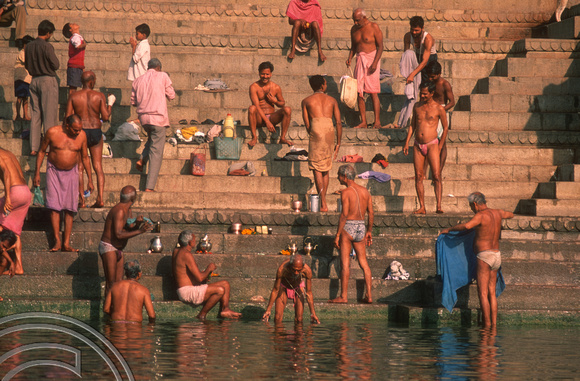 T6876. Praying at the ghats. Varanasi. Uttar Pradesh. India. February 1998