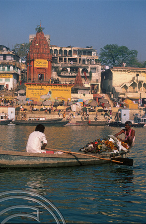 T6833. Rubbish boat on the Ganges. Varanasi. Uttar Pradesh. India. February 1998