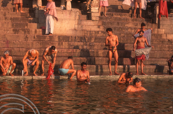 T6812. People bathing at the Ghats at dawn. Varanasi. Uttar Pradesh. India. February 1998