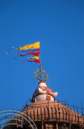 T6696. Flags atop the Jagganath Temple. Orissa. India. February 1998