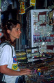 T5812. Lynn buying bangles in the market. Mysore. Karnataka. India. January 1996