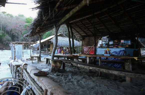 T015835. Food shacks on the little beach. Padangbai. Bali. Indonesia. 16th September 2003