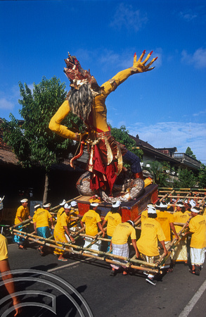 T015881. Statue of a God in a procession. Ubud. Bali. Indonesia. 19th September 2003