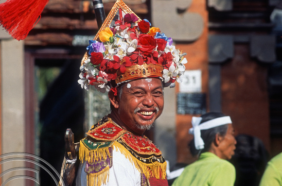 T015929. Man dressed as a warrior in a procession. Ubud. Bali. Indonesia. 19th September 2003