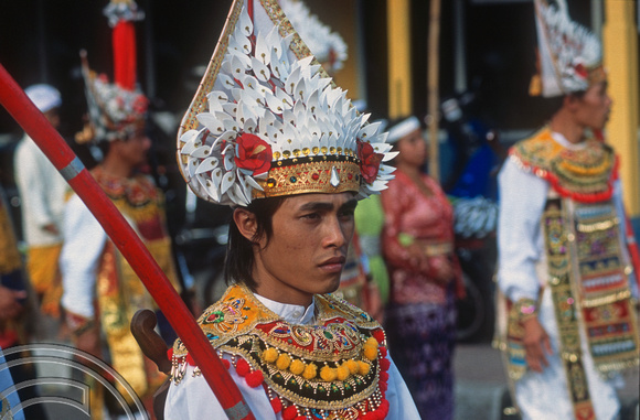 T015934. Man dressed as a warrior in a procession. Ubud. Bali. Indonesia. 19th September 2003