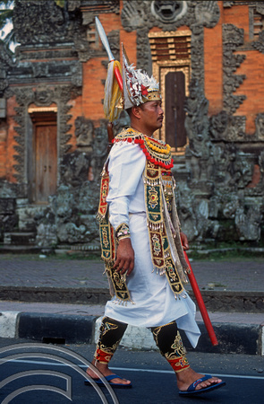 T015939. Man dressed as a warrior in a procession. Ubud. Bali. Indonesia. 19th September 2003