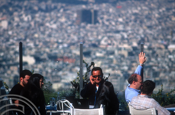 T18068. Dining alfresco with a view. Athens. Greece. February 2004.