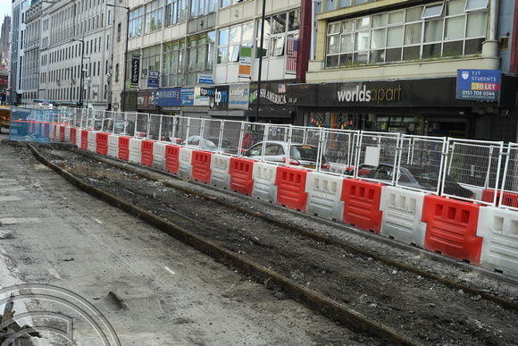 DG352470. Digging up old tram tracks. Lime St. Liverpool. 8.7.2021