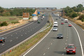 DG04413. 143s crosses the M5. Gloucester. 9.9.05