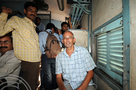 DG77491. Me on crowded train. Gujarat. India. 26.3.11