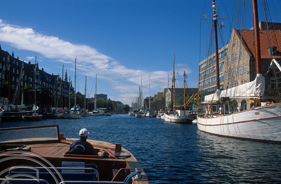 T5426. Cruising a canal in Christianshaven. Copenhagen. Denmark. August 1995