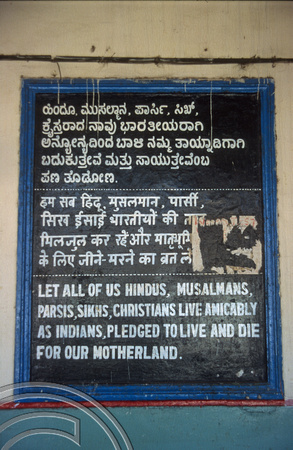 T5897. Quote on the railway station. Mysore. Karnataka. India. January 1996.