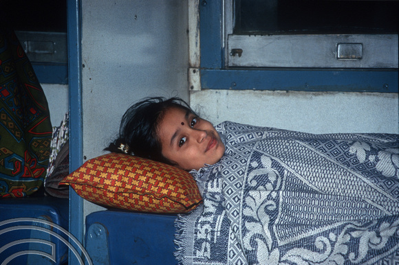 T5908. Girl on the sleeper to Goa. Karnataka. India. January 1997
