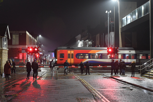 DG313217. Trains and wet streets. Lincoln. 22.11.18