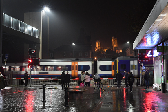 DG313237. Trains and wet streets. Lincoln. 22.11.18